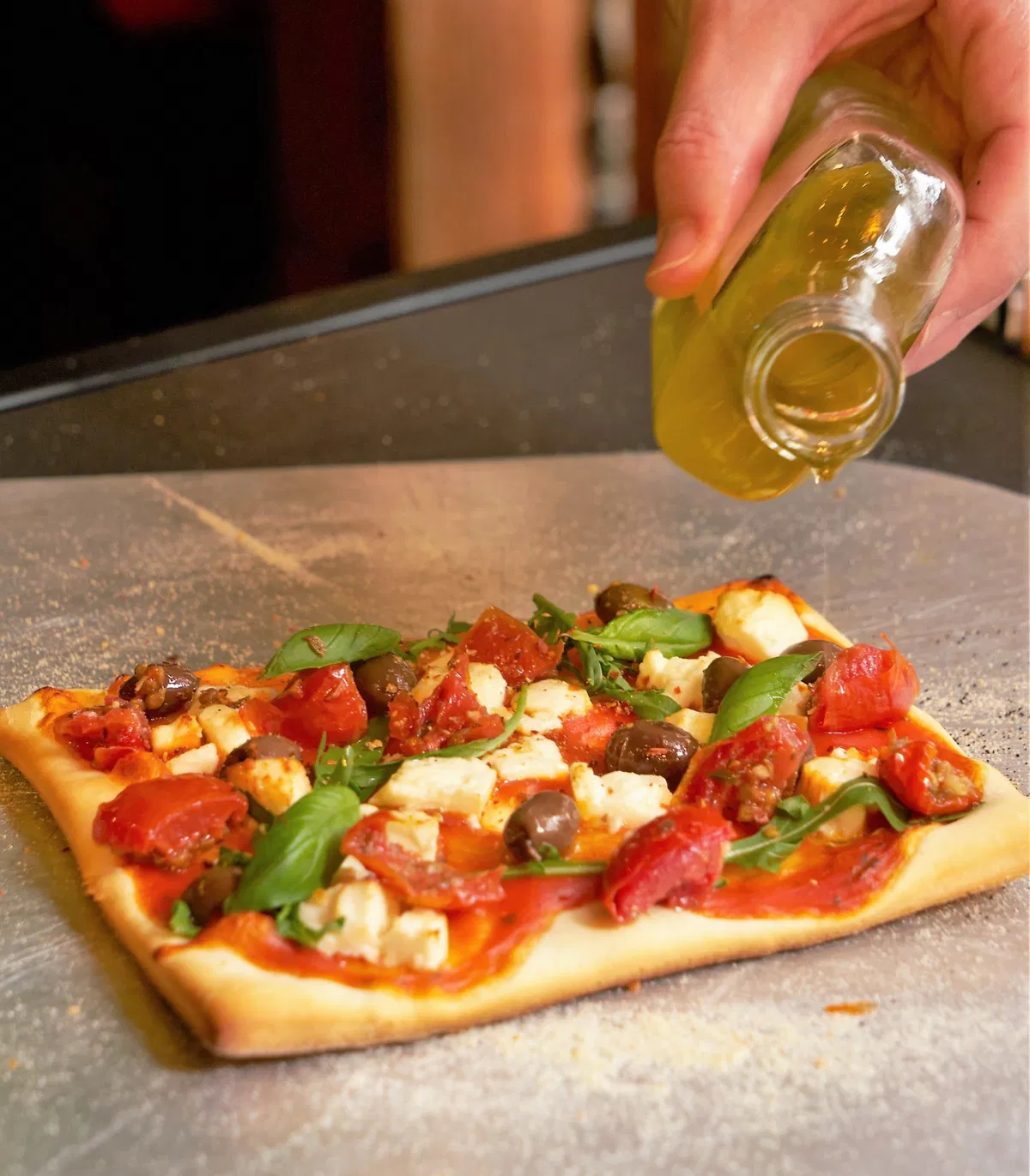 Recept: pizza met tomaten frito, feta en olijven